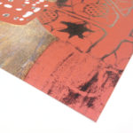 Particolare stampa su cartoncino rosso metallizzato